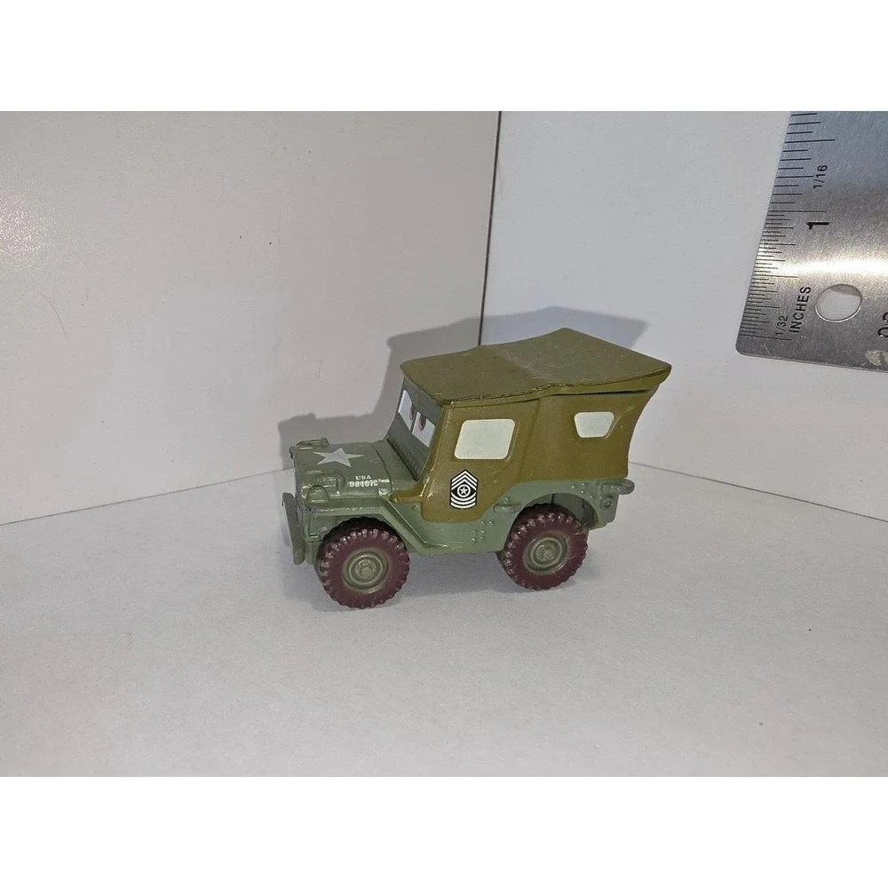 Disney/Pixar Cars Sarge diecast vehicle, specifically from the 1:55 scale Mattel